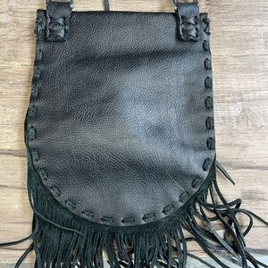 Elegant Black Leather Crossbody Bag with Fringe